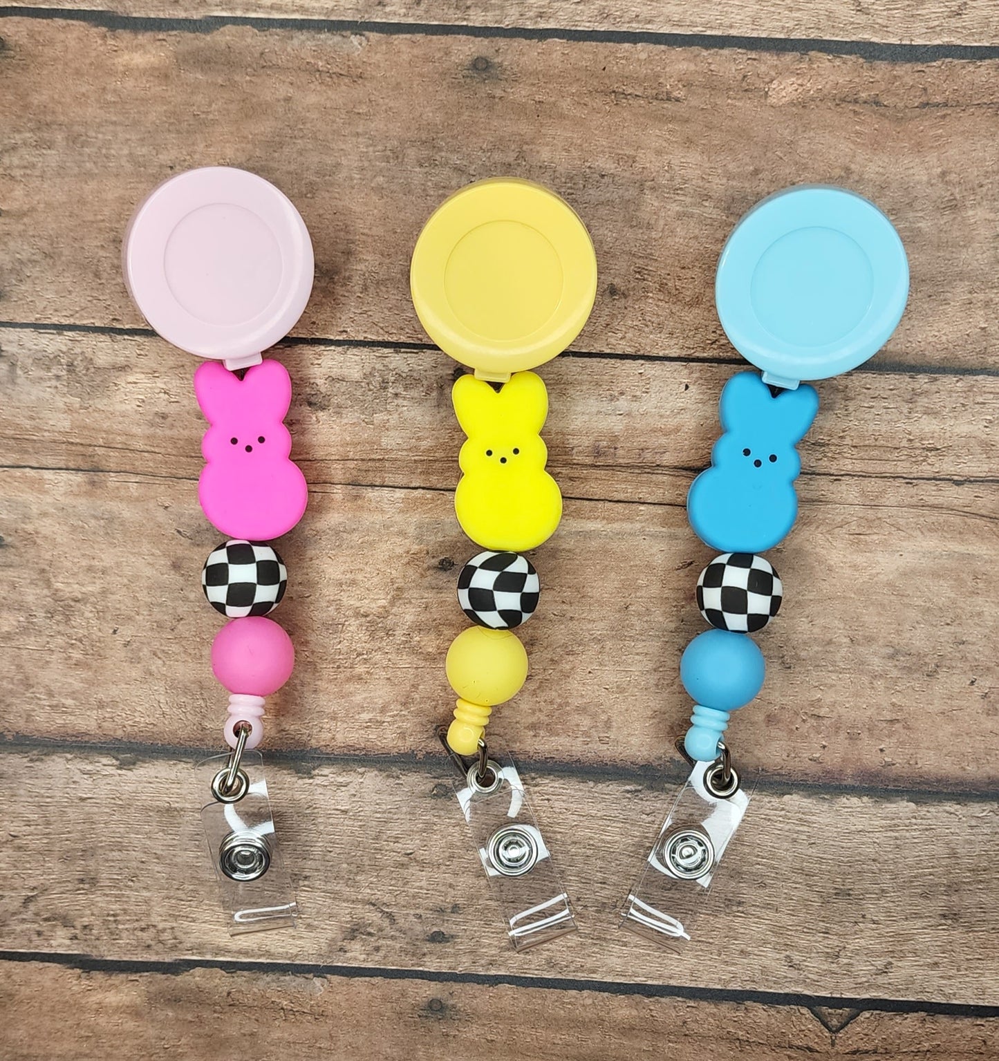 Glow Checker Bunny Badge Reels