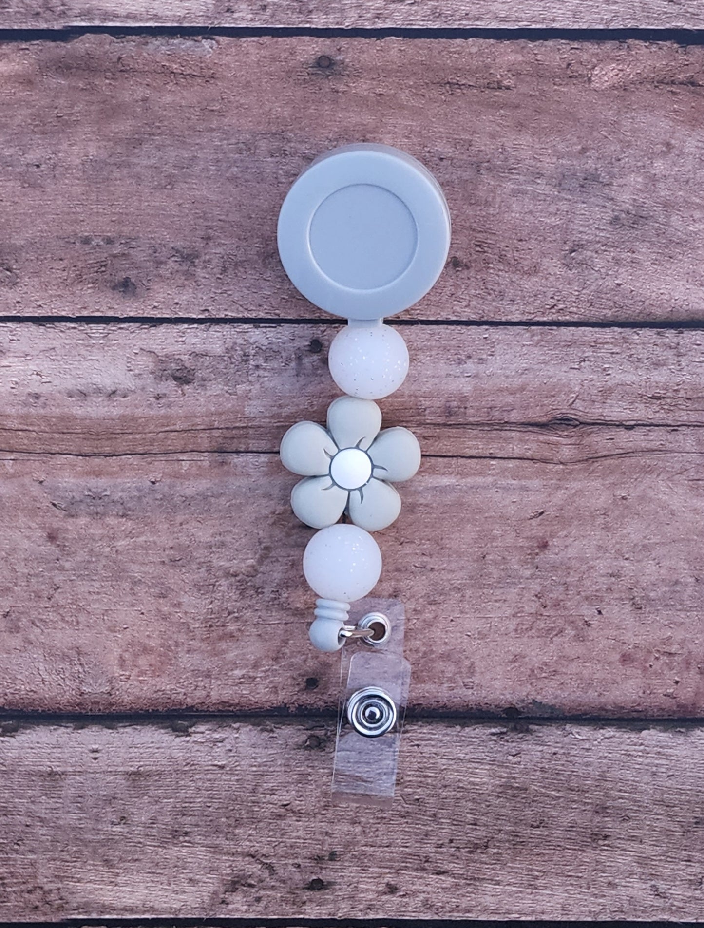 Gray Puffy Flower Badge Reel