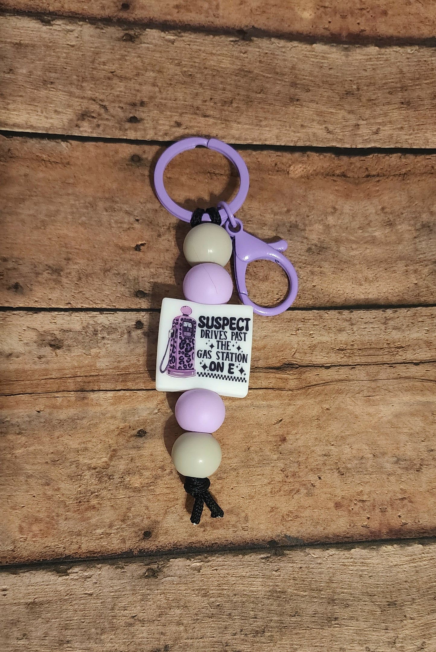 Suspect Drives Past Gas Station Mini Keychain