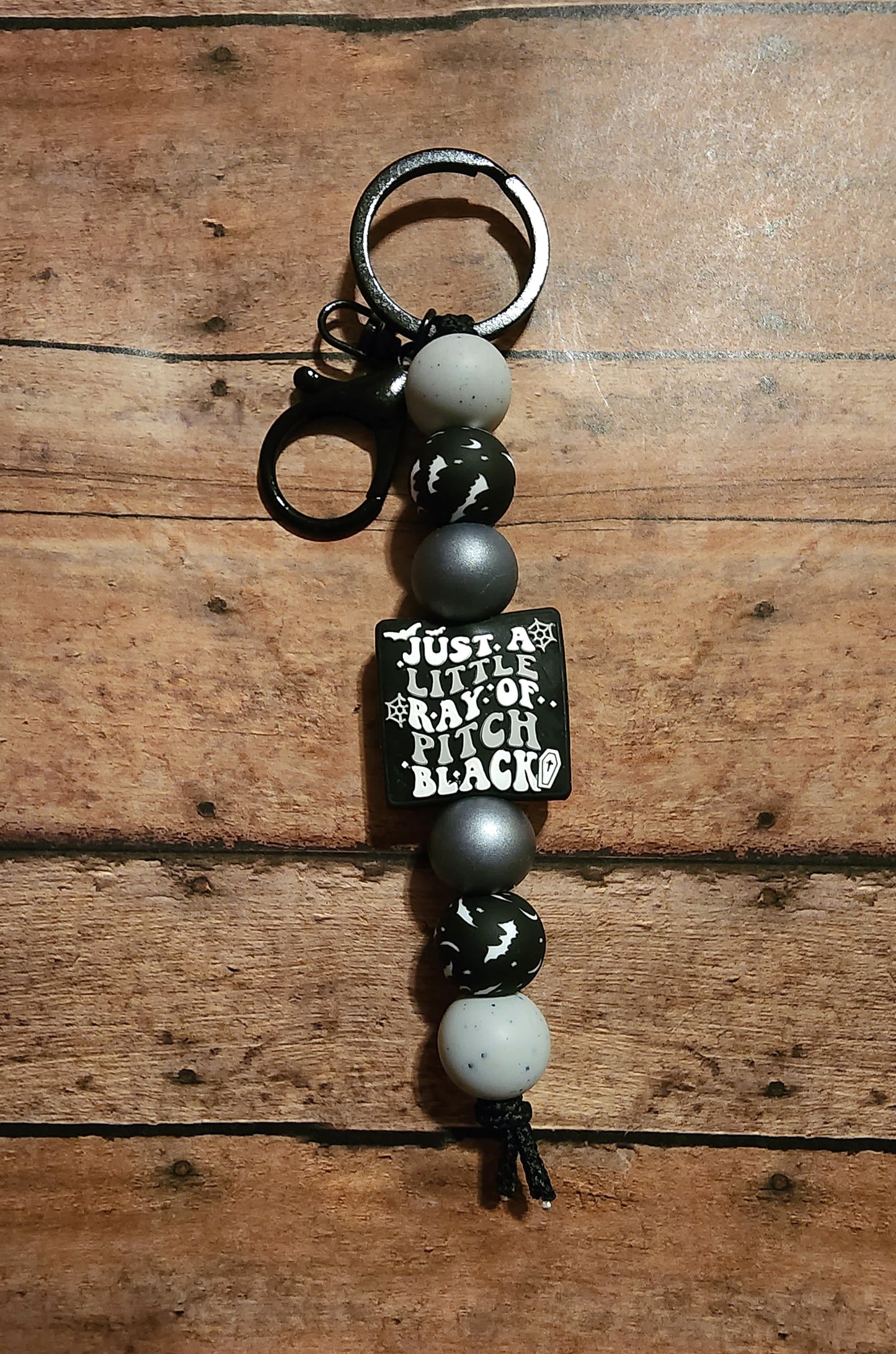 Just a Little Ray of Pitch Black | Silicone Beaded Keychain