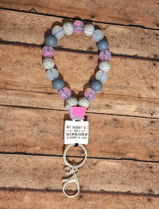 "My Hubby & I Run a Workshop, He Works I Shop" Silicone Bead Teardrop Wristlet | Leopard Print Heart Confetti Glitter Silicone Beaded Wristlet Keychain