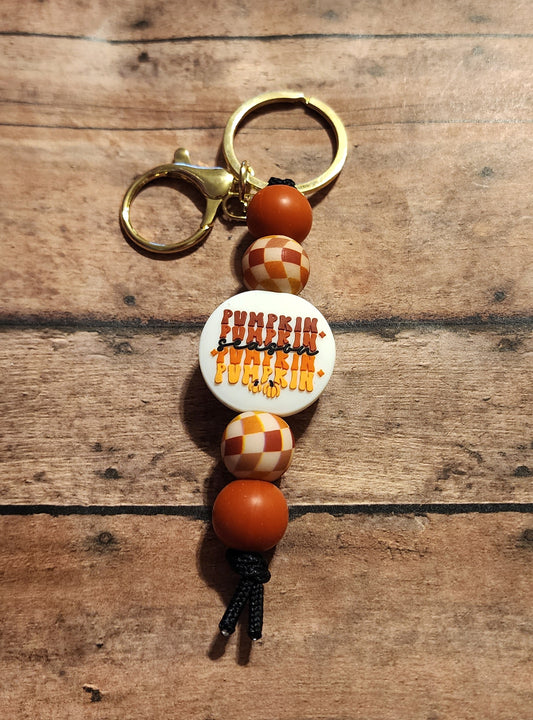 Pumpkin Season Checker | Silicone Beaded Mini Keychain